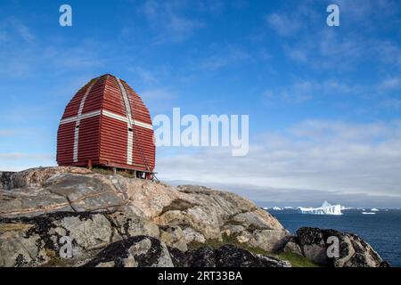 Qeqertarsuaq, Greenland, July 5, 2018: The old wooden whale watching tower. Qeqertarsuaq is a port and town located on the south coast of Disko Stock Photo