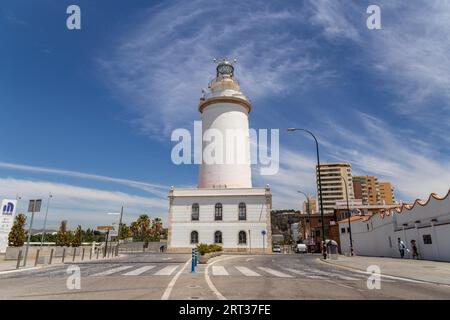 Malaga, Spain, May 24, 2019: Exterior view of the white lighthouse La Farola de Malaga Stock Photo