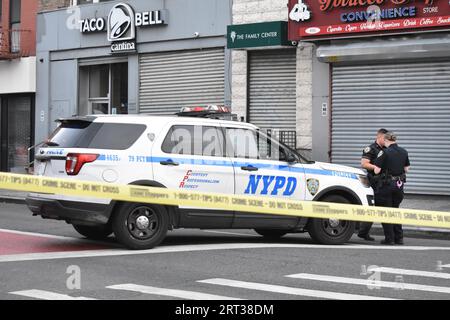 Brooklyn, United States. 10th Sep, 2023. Police guard the crime scene. Three people shot at Fulton Street and Nostrand Avenue in Brooklyn. Two females and one male were shot in Brooklyn on Sunday. All victims shot are in stable condition and a suspect or suspects are not in custody yet. Over 10 shell casings were recovered at the scene and large pools of blood were discovered on the sidewalk and on the steps of a subway entrance. Credit: SOPA Images Limited/Alamy Live News Stock Photo