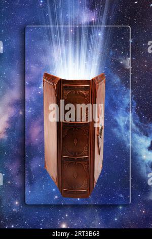 magic book with mystical light coming from inside it Stock Photo