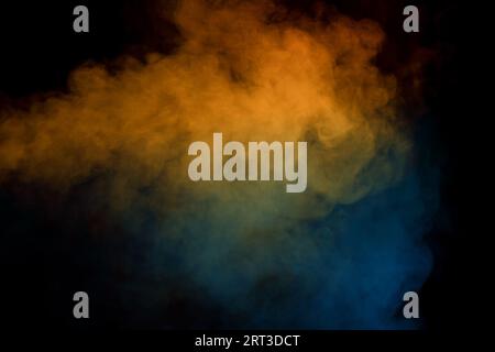 Blue and green steam on a black background. Copy space. Stock Photo