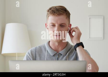 Portrait of positive businessman having online meeting with colleagues Stock Photo