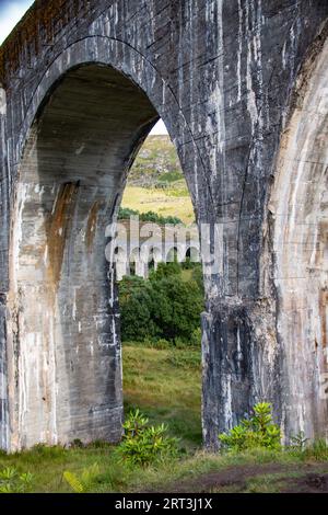 Glenfinnan Viaduct, iconic 1901 railway with a curving, 21-arch span, featured in several Harry Potter movies, Glenfinnan, West Highlands, Scotland Stock Photo