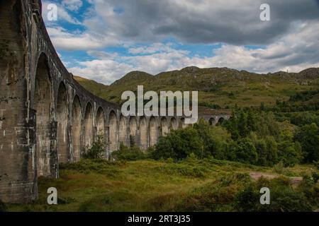 Glenfinnan Viaduct, iconic 1901 railway with a curving, 21-arch span, featured in several Harry Potter movies, Glenfinnan, West Highlands, Scotland Stock Photo