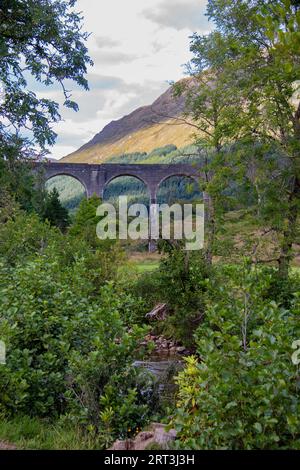 Glenfinnan Viaduct, iconic 1901 railway with a curving, 21-arch span, featured in several Harry Potter movies, Glenfinnan, West Highlands, Scotland Stock Photo