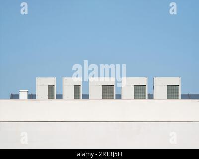 Cooling systems on building roofs. heating and cooling. Stock Photo