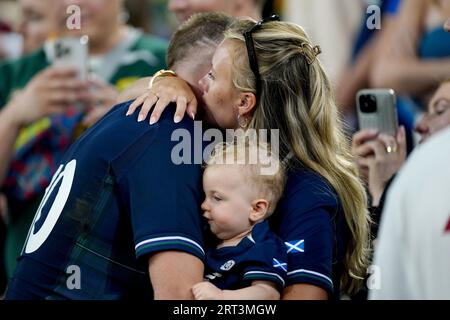 Scotland's Finn Russell with girlfriend Emma Canning and daughter Charlie after the 2023 Rugby World Cup Pool B match at the Stade de Marseille, France. Picture date: Sunday September 10, 2023. Stock Photo