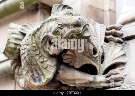 Gargoyle decorating the facade of 19th century Manchester Crown Court on Minshull Street, Manchester, England Stock Photo