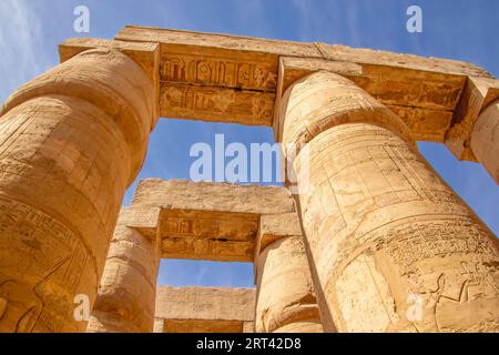 Columns with Egyptian hieroglyphs and ancient symbols. Famous Egyptian ...