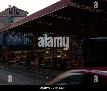 Pijaca Markale Food Market at dusk as a car is blurred in the foreground in the city of Sarajevo, Bosnia and Herzegovina, September 10, 2023 Stock Photo