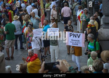 Madrid, Spain. 10th Sep, 2023. A group of demonstrators hold placards during the rally. Supporters of the Spanish right have gathered at the doors of the Madrid city hall to protest against the government of the acting prime minister Pedro Sánchez and the possible amnesty in favor of the Catalan political leader Carles Puigdemont, fleeing from justice. Credit: SOPA Images Limited/Alamy Live News Stock Photo