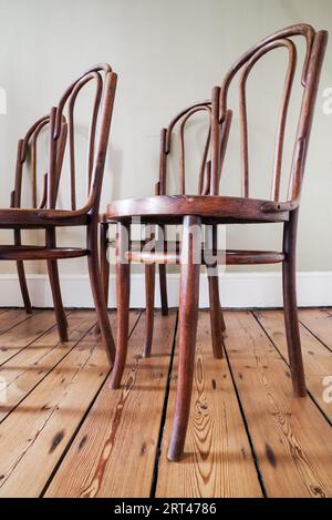 Antique Thonet style bentwood chairs - such as this chair made by Mundus circa 1920 - are very popular in interior design Stock Photo