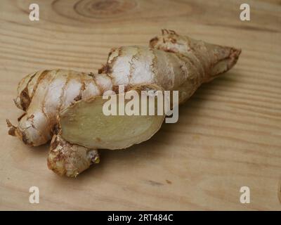 Ginger root with sliced portions Stock Photo