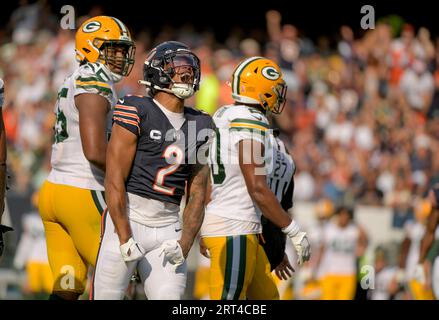 Chicago Bears wide receiver DJ Moore carries the ball in traffic during the  first half of an NFL football game against the Green Bay Packers Sunday,  Sept. 10, 2023, in Chicago. (AP