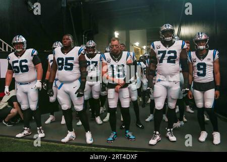 Carolina Panthers defensive tackle Derrick Brown (95) wears a Crucial Catch  t-shirt as he warms up prior to an NFL football game against the  Philadelphia Eagles, Sunday, Oct. 10, 2021, in Charlotte