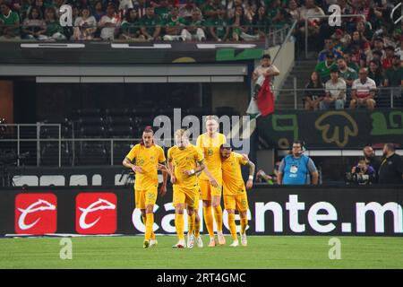 Arlington, Texas, United States: Australian players Jackson Irvine (22), Nathaniel Atkinson (3) and Martin Boyle (6) celebrate Harry Souttar's (19) goal during the international soccer game between Mexico and Australia played at AT&T Stadium on Saturday September 9, 2023. (Credit Image: © Javier Vicencio/eyepix via ZUMA Press Wire) EDITORIAL USAGE ONLY! Not for Commercial USAGE! Stock Photo