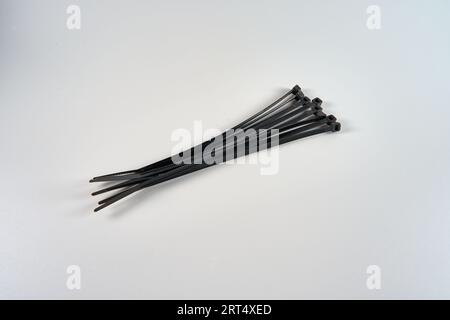 Eight zip ties on a white background Stock Photo