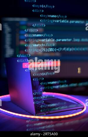 SEO optimization. Modern tech. PHP syntax highlighted. Writing programming functions on laptop. Big data and Internet of things trend. Stock Photo
