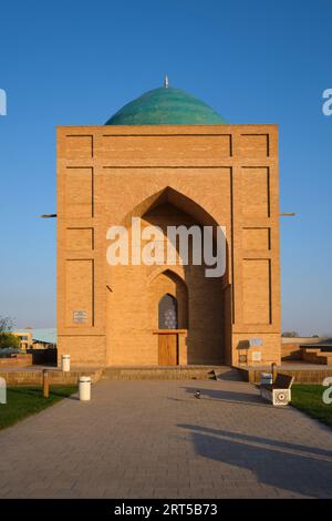 Late afternoon, sunset view with glowing, golden hue. At the Rabia Sultan Begum mausoleum in Turkestan, Kazakhstan. Stock Photo