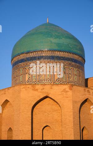 Late afternoon, sunset view with glowing, golden hue. At the Rabia Sultan Begum mausoleum in Turkestan, Kazakhstan. Stock Photo