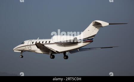 Landing small private passenger plane Stock Photo