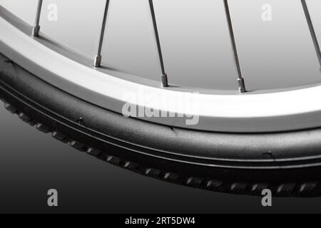 Front bicycle wheel. Close-up. Isolated on white background. Stock Photo