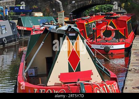 Colourful narrowboats moored in marina, Skipton Stock Photo