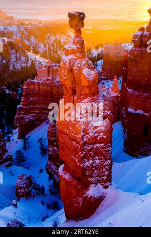 Winter sunrise in Bryce Canyon National Park, Utah over the park's famous rock formation Thor's Hammer; December 2007 Stock Photo