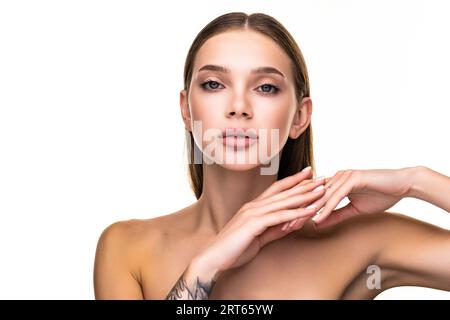 Back view of woman with perfect smooth skin on white background