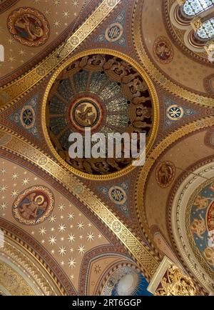 The highly decorated domed ceiling of St Christopher's Chapel at Great Ormond Street Hospital for Children, Bloomsbury, London UK. Stock Photo