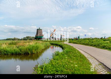 Zaanse Schans, Zaandam, Holland -July 18, 2023: Netherlands rural lanscape Windmills at famous tourist site. Stock Photo