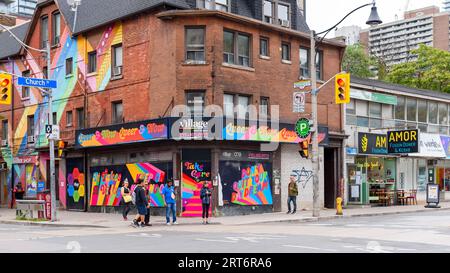 Toronto, Canada, is an old building decorated with rainbow colors in the Gay Village. Stock Photo