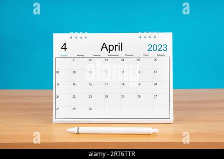 April monthly desk calendar for 2024 year and model dentures on the table.  Dental health concepts Stock Photo - Alamy