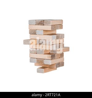 Wooden blocks playing the tower game isolated on white and lined up in a tower. Stock Photo