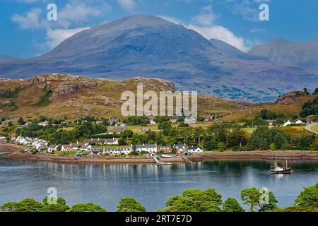 Shieldaig Sutherland Scotland looking across the Loch to the village houses and hills in late summer Stock Photo