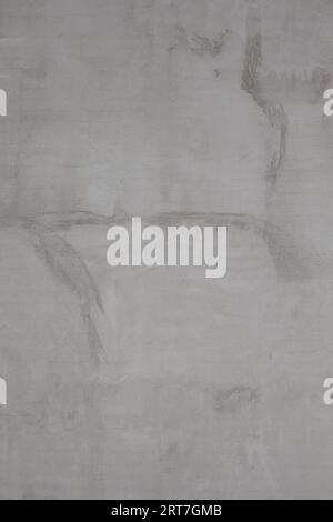 Vertical photo of gray wall, background of fresh plaster texture Stock Photo