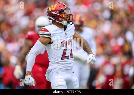 Washington Commanders QB Sam Howell (14) shows off his legs and runs  towards the end zone at the Arizona Cardinals vs Washington Commanders game  (Week 1) on September 10 2023 at FedEx