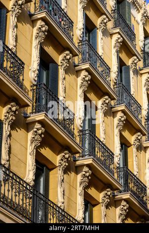 Art Nouveau decoration on a modernist building, now the Hostal la Macarena, in Cava de San Miguel, Madrid, Spain. Stock Photo