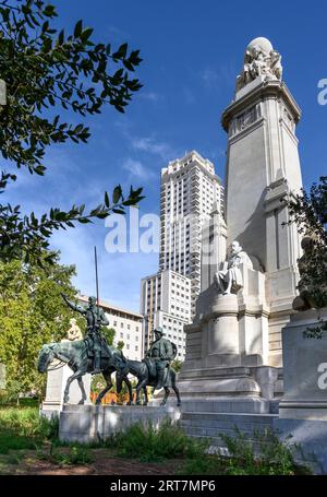 Monument to Cervantes and statues of Don Quixote and Sancho Panza in the Plaza de Espana, with the Torre de Madrid  in the background , Madrid, Spain. Stock Photo