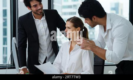 Happy employees working together at high building office Stock Photo