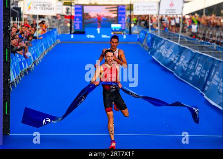 Valencia, Spain. 03rd Sep, 2023. David Cantero Del Campo (F) of Spain seen crossing the finishing line during the bike race of 2023 Triathlon World Cup in La Marina de Valencia. Credit: SOPA Images Limited/Alamy Live News Stock Photo