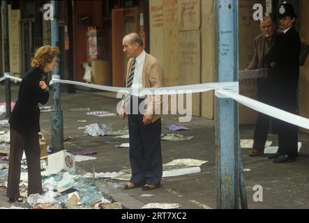 Brixton Riots 1981 UK. The day after firefighter making sure the ...