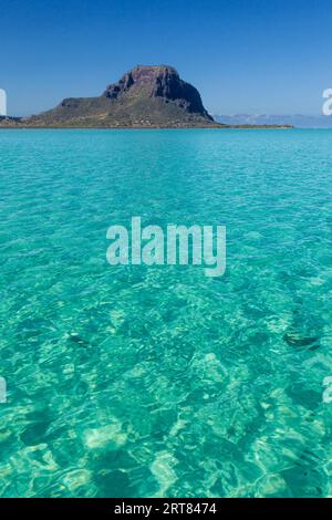 View over the turquoise waters of the lagoon to Le Morne Brabant in the southwest of Mautitius Stock Photo