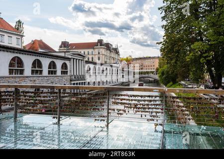 View over the Ljubljanica river to the famous market place in Ljubljana on sunny day Stock Photo
