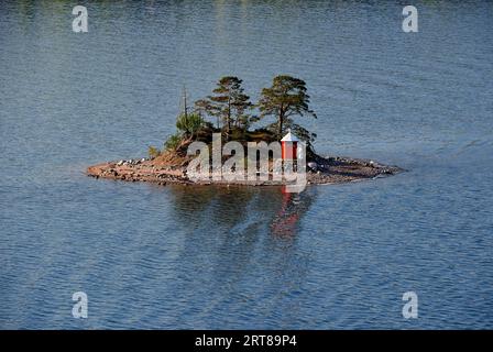 Aerial view on scandinavian skerry coast with lighthouse Stock Photo