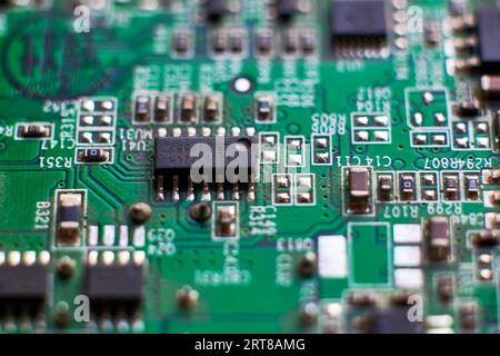 Printed circuit Board with chips and radio components electronics Stock Photo
