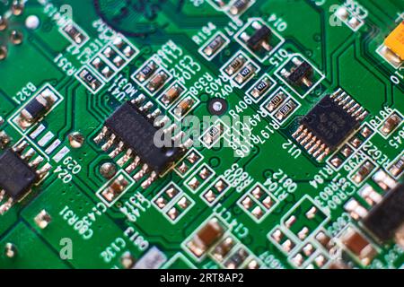Printed circuit Board with chips and radio components electronics Stock Photo