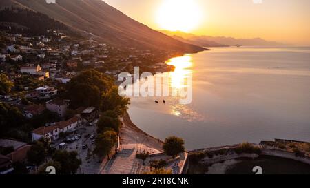 Aerial drone view of the beautiful landscape of Shiroka Lake at sunset near Shkoder. Albania Stock Photo