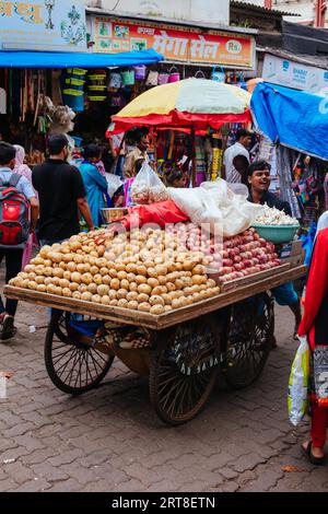 Mumbai, India, August 5 2017: Fresh fruit and vegetables at a market stall in Colaba Causeway Market in Mumbai, India Stock Photo