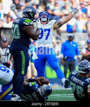 Defensive tackle (97) Michael Hoecht of the Los Angeles Rams warms up  before playing against the San Francisco 49ers in an NFL football game,  Monday, Oct. 3, 2022, in Santa Clara, Calif.